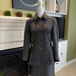 St. John Collection sophisticated black and grey tweed suit.